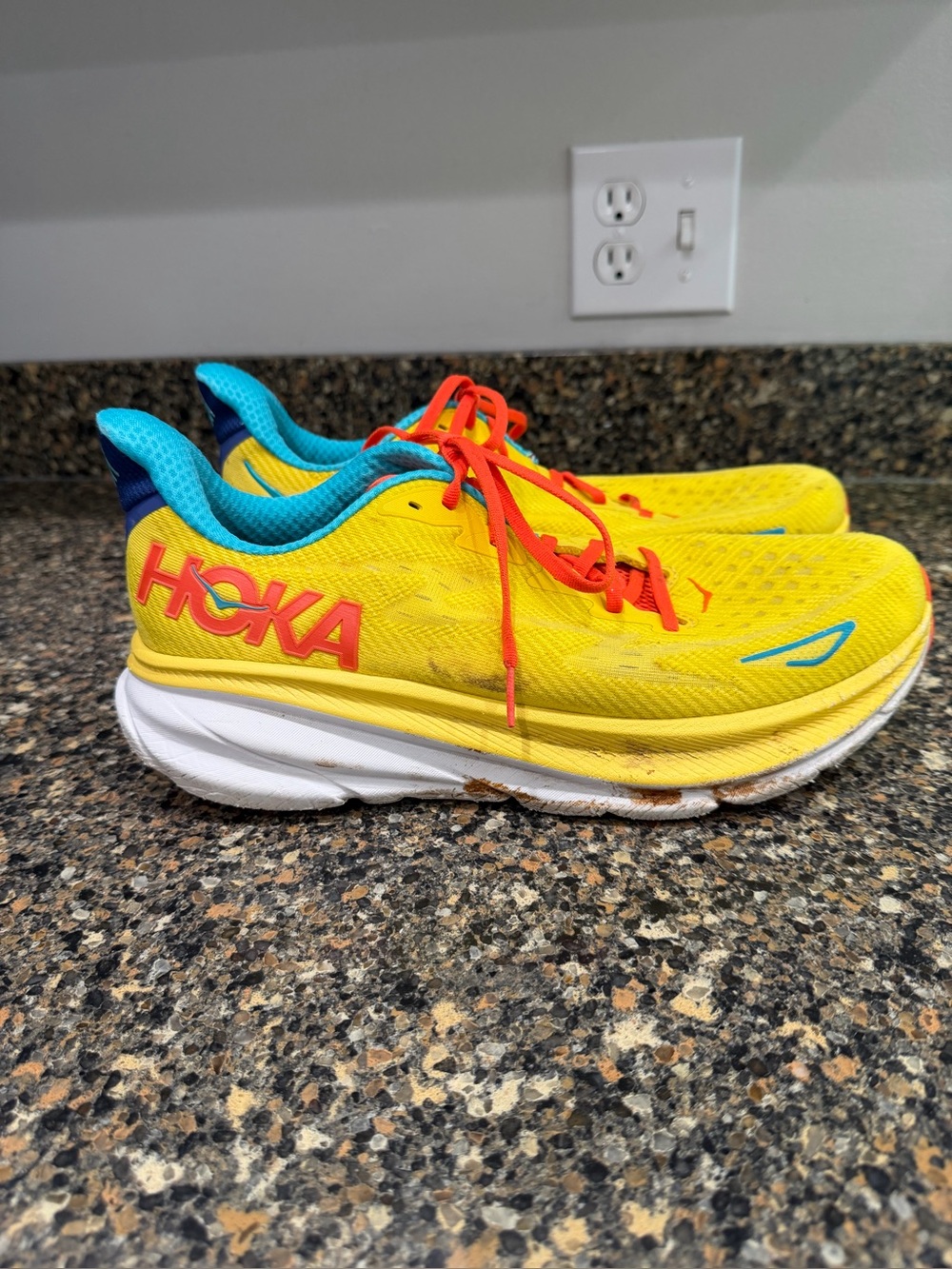 Hoka mens 11 Yellow Sneakers with Turquoise and Red Accents